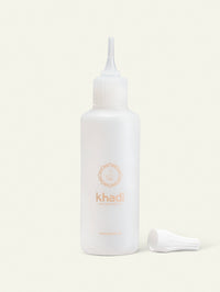 Immagine di un flacone per la cura dei capelli di khadi